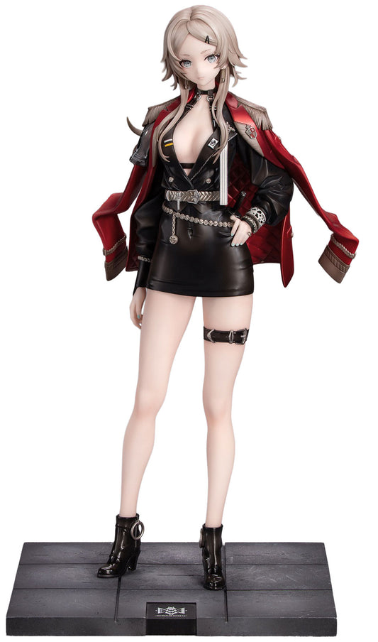 A full-body anime-style female figurine standing on a black display base, wearing a black leather-look mini dress with silver chain details, a red-and-black open jacket, thigh straps, and black ankle boots.