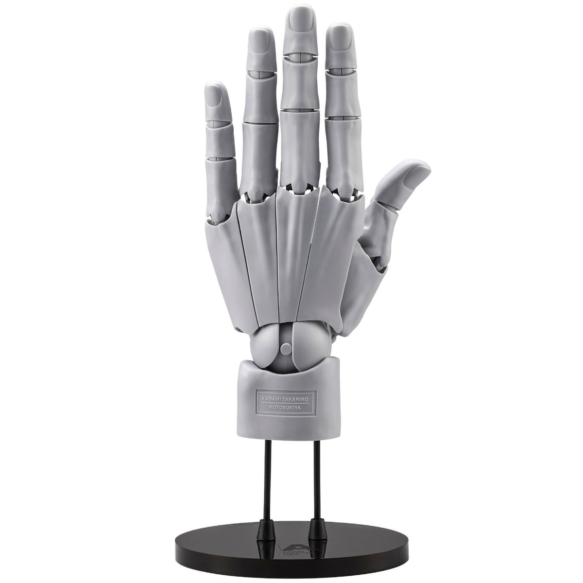 Gray mechanical hand model on a black stand against a white background
