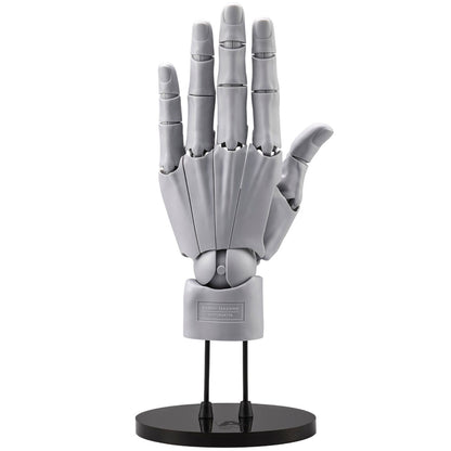 Gray mechanical hand model on a black stand against a white background