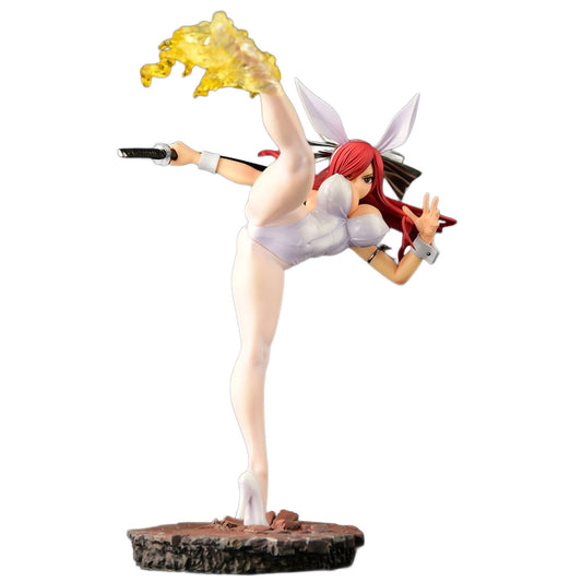 A collectible anime figurine of Erza Scarlet from Fairy Tail with red hair, bunny ears, and white bunny underwear, posed in a high kick with a yellow flame effect and holding a sword, mounted on a rocky base against a white background.