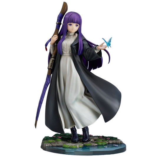 A detailed anime figurine of Fern from Frieren: Beyond Journey's End with long purple hair, wearing a long white dress and dark coat, holding a large stuff and a small blue butterfly, standing on a decorative base against a white background.