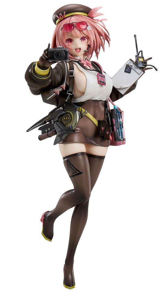An anime-style female character figurine posed dynamically against a plain white background. She has pink hair, wears a brown and white military-inspired outfit with thigh-high stockings, and holds a camera and a small device.