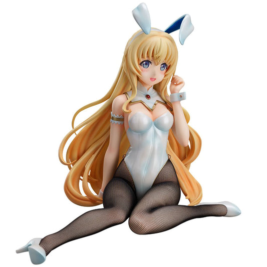 A Priestess from Goblin Slayer figurine with long blonde hair, bunny ears, a white bodysuit, fishnet stockings, and white high heels, posed sitting against a plain white background.