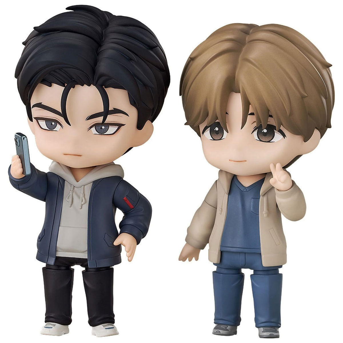 Jinx Joo Jaekyung and Kim Dan Nendoroid figure set featuring two chibi-style characters with black and brown hair, casual outfits, expressive faces, and poses holding a smartphone and making a peace sign.