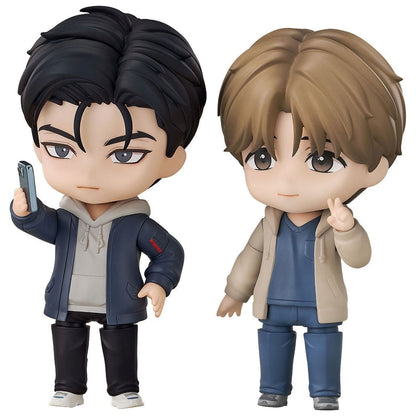 Jinx Joo Jaekyung and Kim Dan Nendoroid figure set featuring two chibi-style characters with black and brown hair, casual outfits, expressive faces, and poses holding a smartphone and making a peace sign.