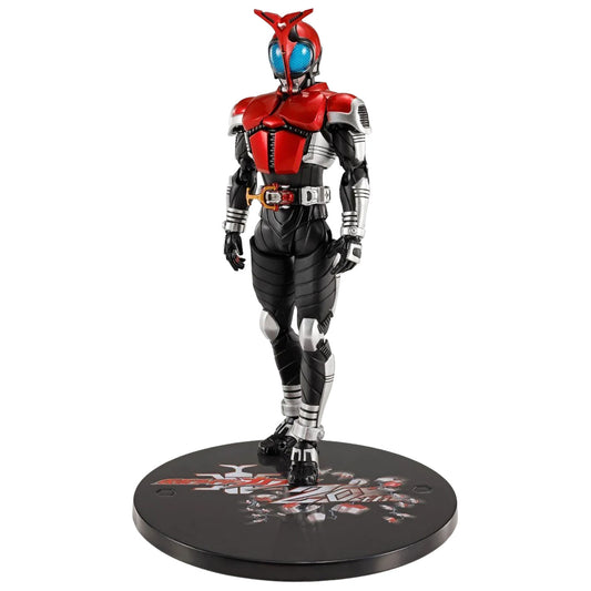 A Kamen Rider Kabuto collectible figure in a red, black, and silver suit, standing on a circular black display base with printed graphics, photographed against a solid white background.