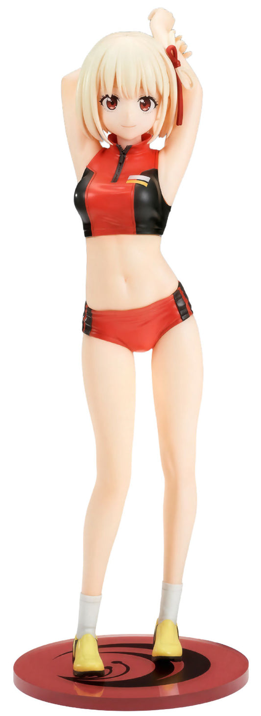 Anime character figurine in red and black outfit on a red base