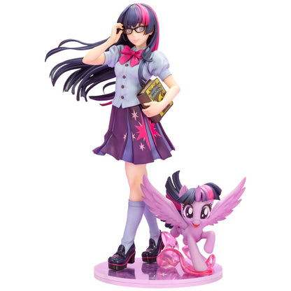 Figure of Twilight Sparkle from My Little Pony with a pony on a white background