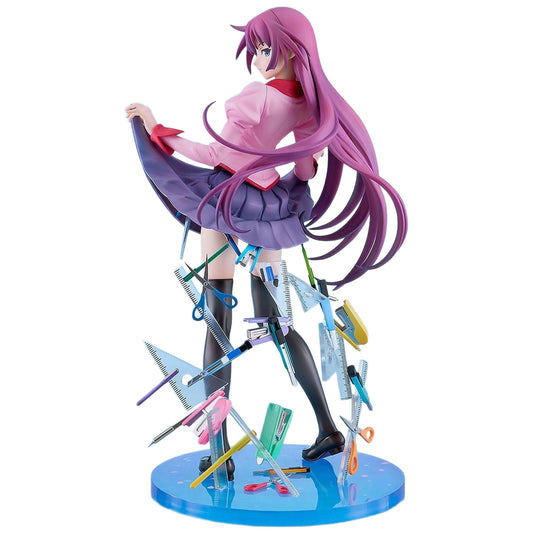 An anime figurine of Hitagi Senjyogahara from Bakemonogatari with long hair, wearing a pink and purple school uniform, surrounded by various colorful school supplies on a blue base, against a plain white background.