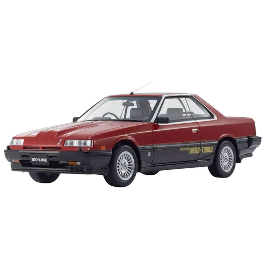 A red and black Nissan Skyline 2000 Turbo RS-X model car with gold side decals, shown from a three-quarter front angle on a solid white background.