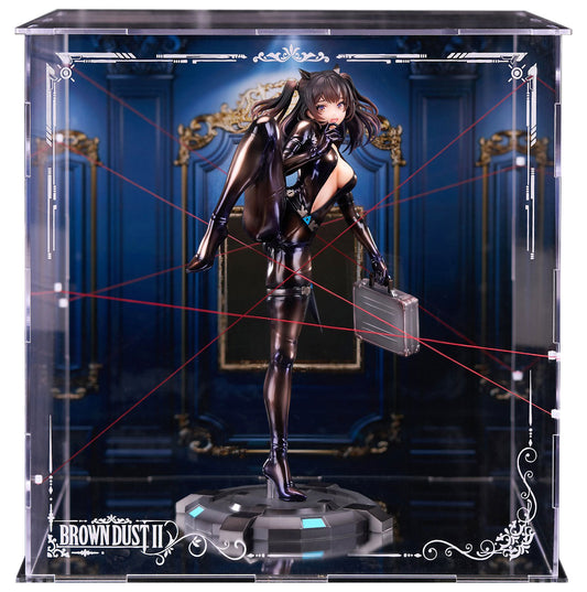 A collectible figurine of BrownDust2 Scheherazade in a glossy black bodysuit, posed inside a clear display case with red laser lines and a blue ornate room backdrop. The case has 'BROWN DUST II' branding at the bottom left.