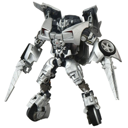 A silver and black robot, Sideswipe from Transformers action figure with sharp metallic limbs and a wheel-like accessory on one arm, shown against a plain white background.